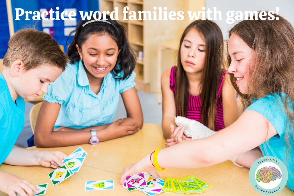 Students playing a game. Practice word families with games.